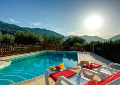 Enjoy superb sunsets from the swimming pool at Casa El Valle, Órgiva