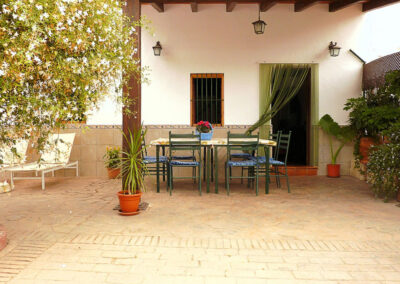 The front patio & alfresco dining area at Casa La Palmera, Arroyo Coche