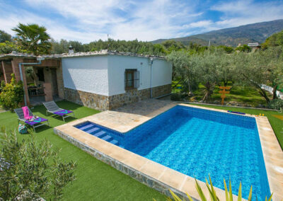 The swimming pool & garden at Cortijo Las Gallinas, Órgiva