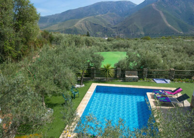 Cortijo Las Gallinas, Orgiva is a two bedroom house filled with Andalucian character & comfortable furnishings. Outdoors there's a shady terrace, garden & olives trees around the private pool. Close to village bars & market with superb mountain views.