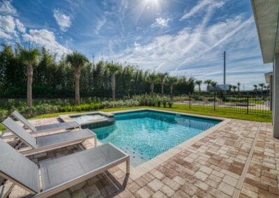 The spillover tub & swimming pool at Encore Resort 550, Kissimmee