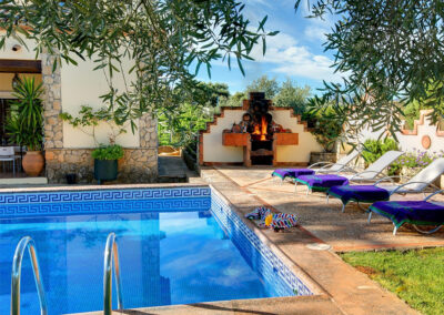The barbecue area & swimming pool at Hacienda Los Olivos, Ronda