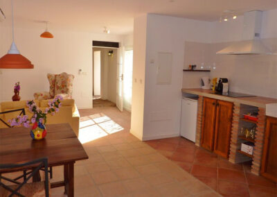 The kitchen, dining & living area of villa #3 at La Abadesa, Nueva Andalucía