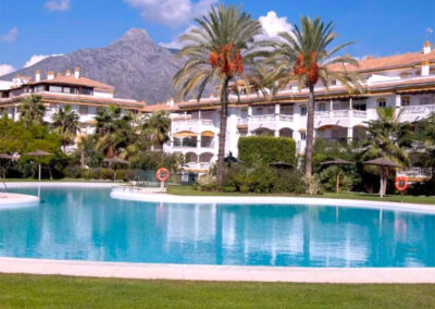 The resort swimming pool at La Dama De Noche, Nueva Andalucía