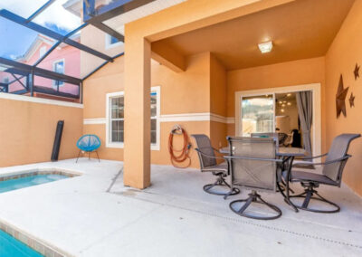 The covered lanai & alfresco dining area at Paradise Palms Resort 85, Kissimmee