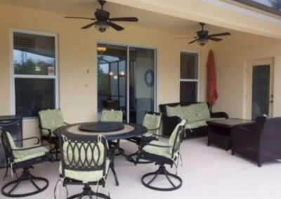 The covered lanai & alfresco dining area at Solterra Resort 131, Davenport