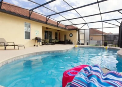Solterra Resort 131, Davenport is a spacious four bedroom, three bathroom home with screened private pool, games room with pool table & video games. Two living area provide ample space for eight guests. Onsite water park, restaurant & tennis just 15 minutes from Disney.