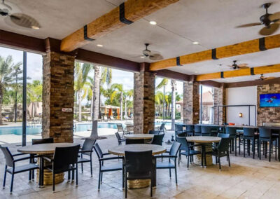 Enjoy cocktails in the poolside bar at Solterra Resort, Davenport, Orlando