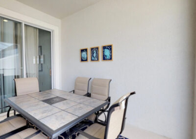 The covered lanai & outdoor dining area at Storey Lake Resort 208, Kissimmee, Orlando