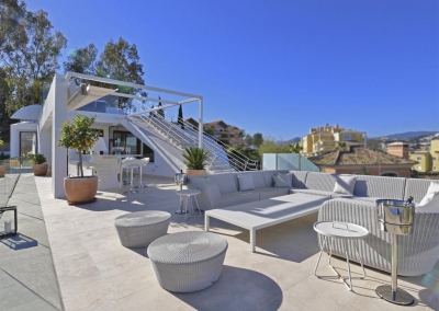 The rooftop bar & lounge area at Villa Calderon, Nueva Andalucía