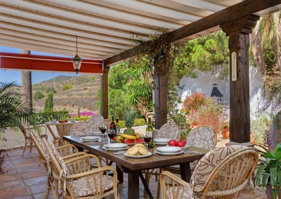 The outdoor dining area at Villa Casanova, Nerja