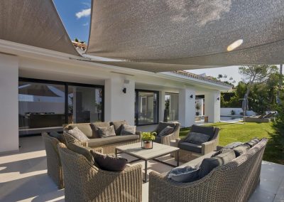 The outdoor living area at Villa Tucan, Nueva Andalucía