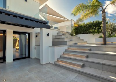 Stairs leading up to the ground floor patio & swimming pool at Villa Tucan, Nueva Andalucía
