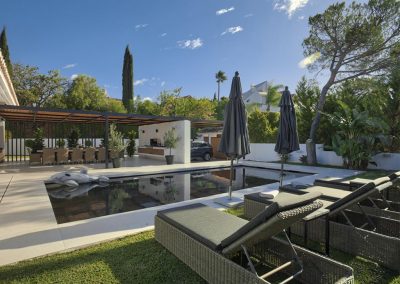 Villa Tucan, Nueva Andalucía is a five bedroom luxury villa for ten with TV room, fully equipped gym & several lounge areas. The sleek kitchen is complemented by an outdoor kitchen with loggia dining area overlooking the serene pool. Close to golf & beach.
