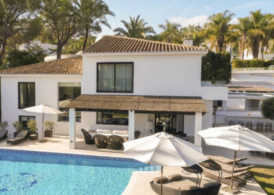 The swimming pool & patio at Villa Yuste, Nueva Andalucía