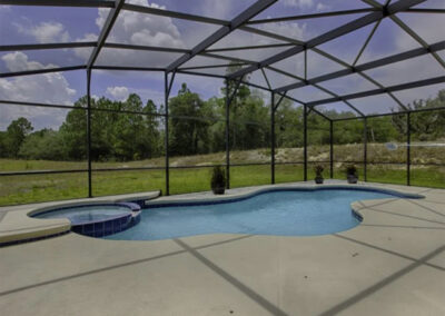The spillover tub & swimming pool at Watersong Resort 32, Davenport