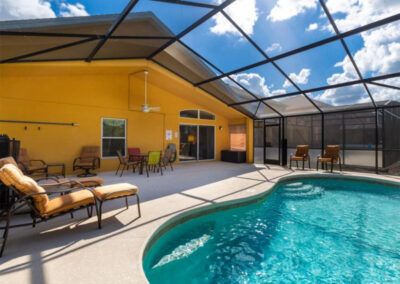 The alfresco dining area & swimming pool at Watersong Resort 50, Davenport