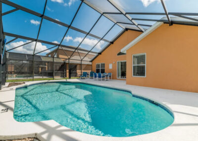 The alfresco dining area & swimming pool at Watersong Resort 81, Davenport