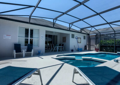 The patio, spillover tub & swimming pool at Windsor Palms Resort 21, Kissimmee, Orlando