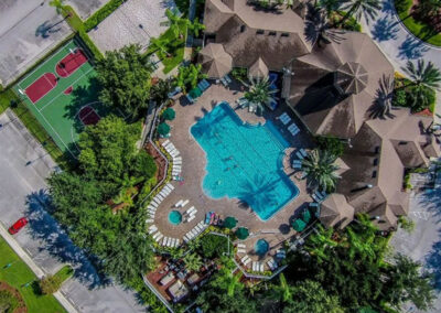 The swimming pool, tiki bar & other resort facilities at Windsor Palms Resort, Kissimmee, Orlando
